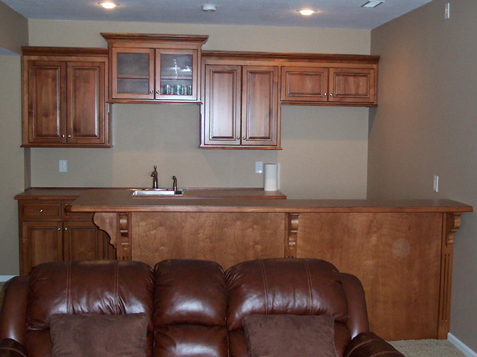 Custom Basement Cabinets Overland Park Kansas with glass doors 